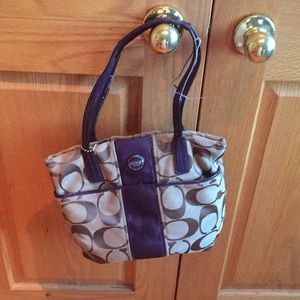 Coach beige purse with purple trim